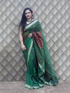 Dhara Patli- Brown and Green With Tribal motifs Sambalpuri Patli Silk Saree