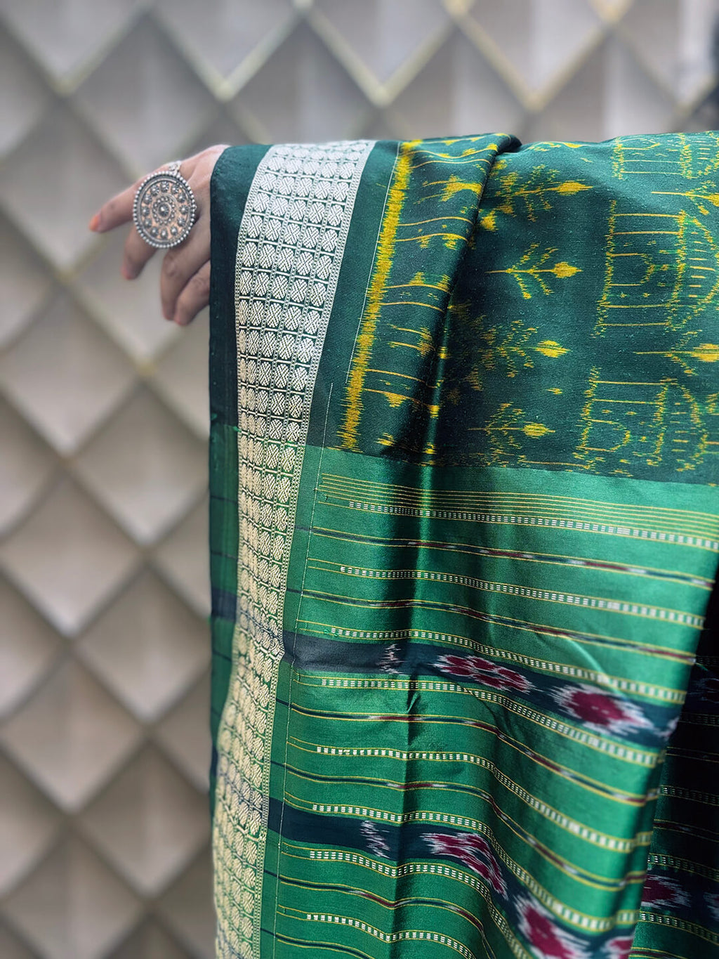Dhara Patli- Brown and Green With Tribal motifs Sambalpuri Patli Silk Saree