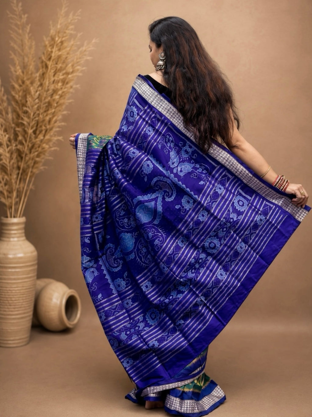 Haritlahiri-Green with golden wave pattern with blue sambalpuri handloom silk saree