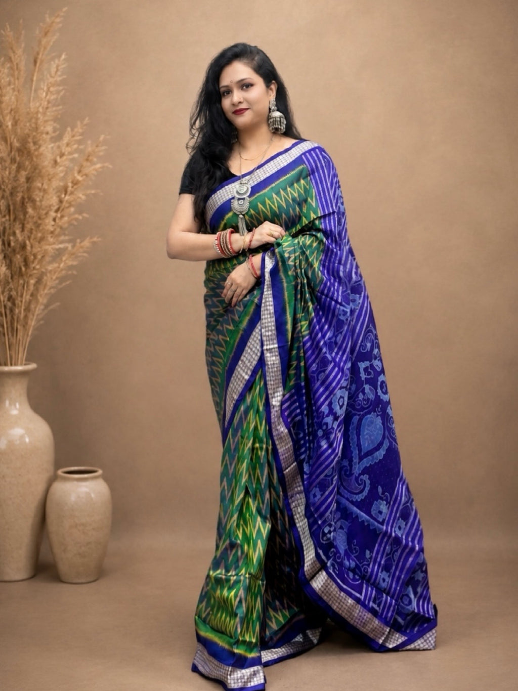 Haritlahiri-Green with golden wave pattern with blue sambalpuri handloom silk saree