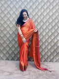 METALLIC BRICK RED WITH GOLDEN BORDER TISSUE SAREE