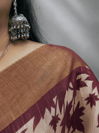 Kasturi Maroon Tussar Ghicha Silk Cotton Saree with Floral Motifs & Zari Border