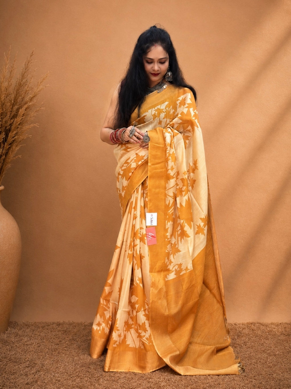 Kasturi Yellow Tussar Ghicha Silk Cotton Saree with Yellow Floral Motifs & Zari Border