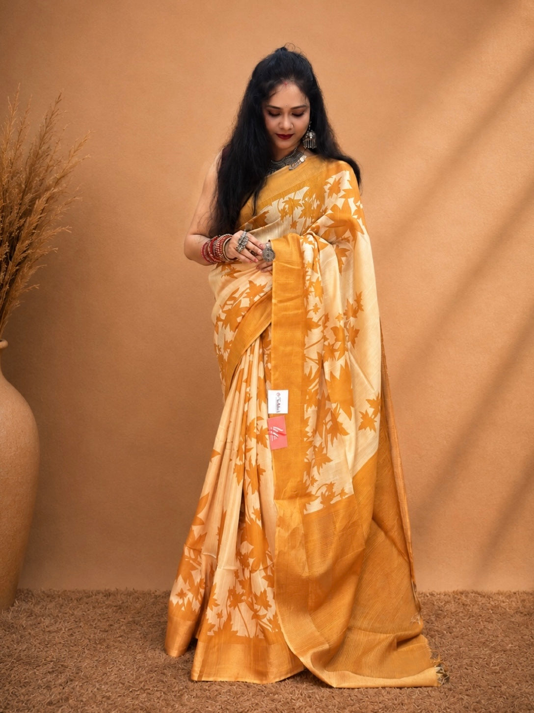Kasturi Yellow Tussar Ghicha Silk Cotton Saree with Yellow Floral Motifs & Zari Border