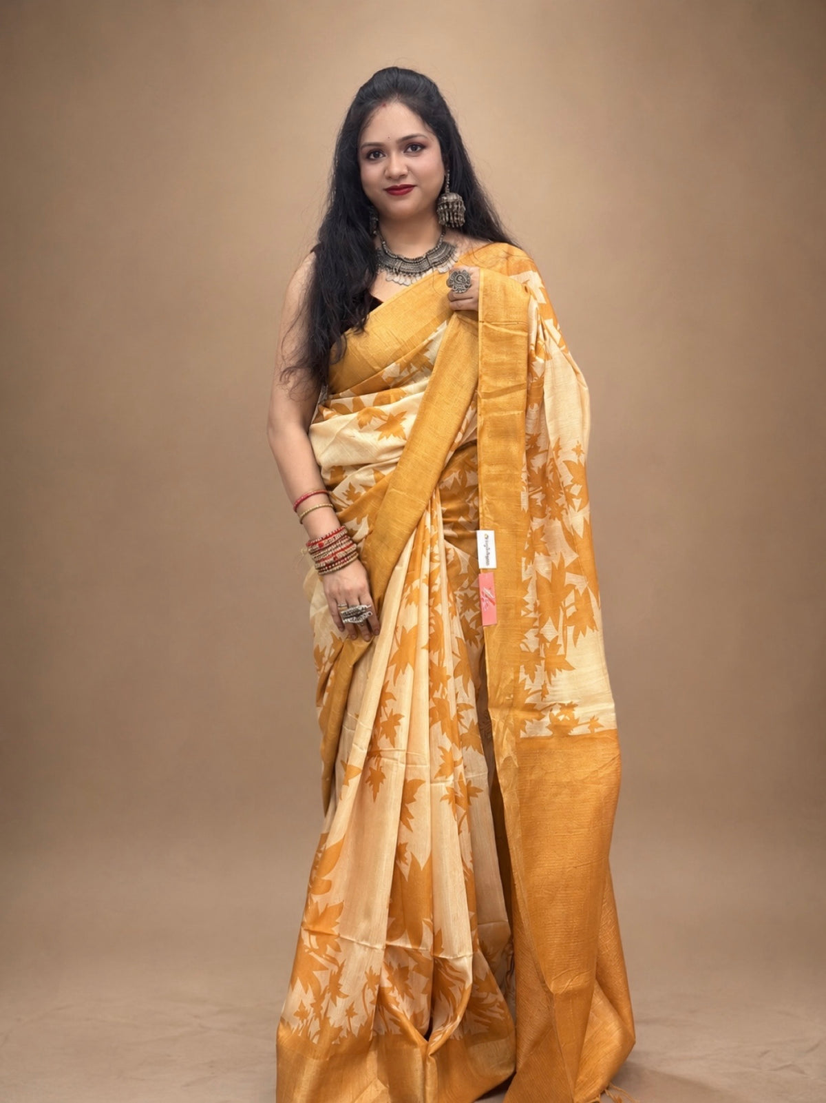 Kasturi Yellow Tussar Ghicha Silk Cotton Saree with Yellow Floral Motifs & Zari Border
