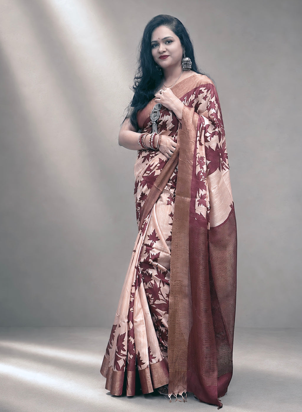 Kasturi Maroon Tussar Ghicha Silk Cotton Saree with Floral Motifs & Zari Border