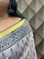 Kavyarekha Pushpa- Grey with black and maroon block printed zari border cotton saree