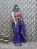 Kesarneel — Saffron & Blue With silver Floral Motif Sambalpuri Silk Saree