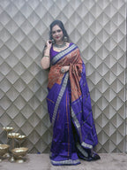 Kesarneel — Saffron & Blue With silver Floral Motif Sambalpuri Silk Saree