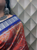 Kesarneel — Saffron & Blue With silver Floral Motif Sambalpuri Silk Saree