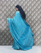 Light Blue Tribal Print Crepe Saree with White Floral & Geometric Patterns