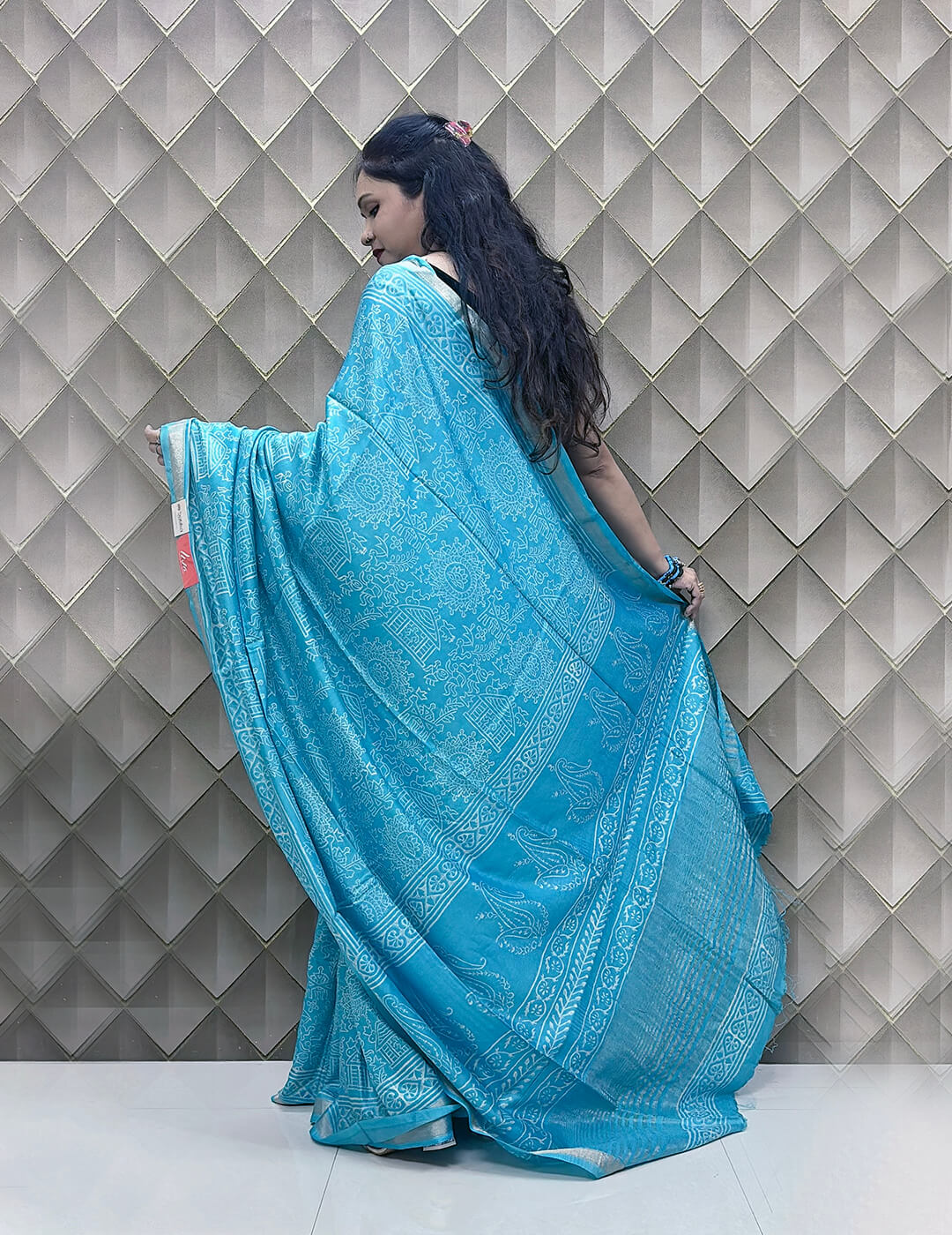 Light Blue Tribal Print Crepe Saree with White Floral & Geometric Patterns