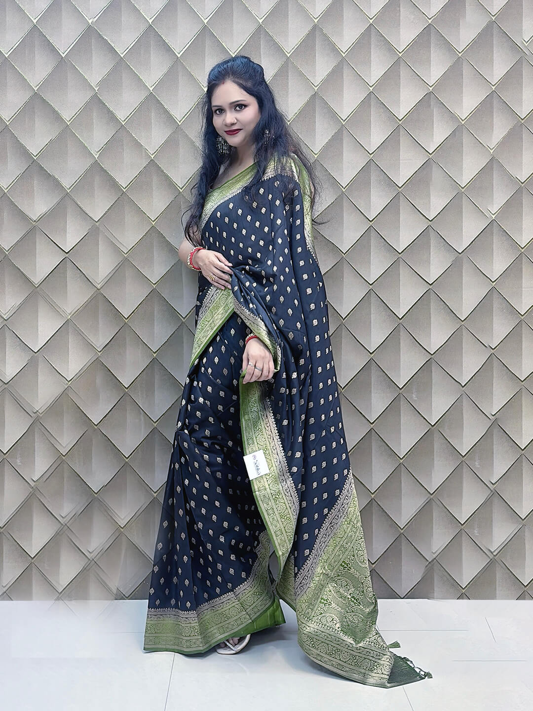 Nisharekha- Black & Green Woven Silk Saree with Heavy Pallu