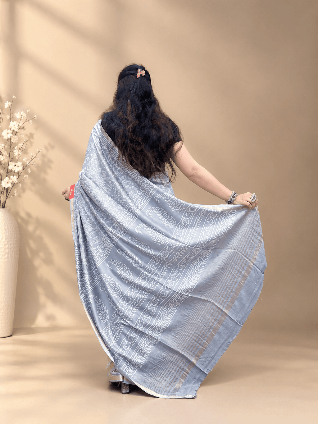 Silver Grey Crepe Silk Saree with Floral & Geometric Motifs and Zari Border