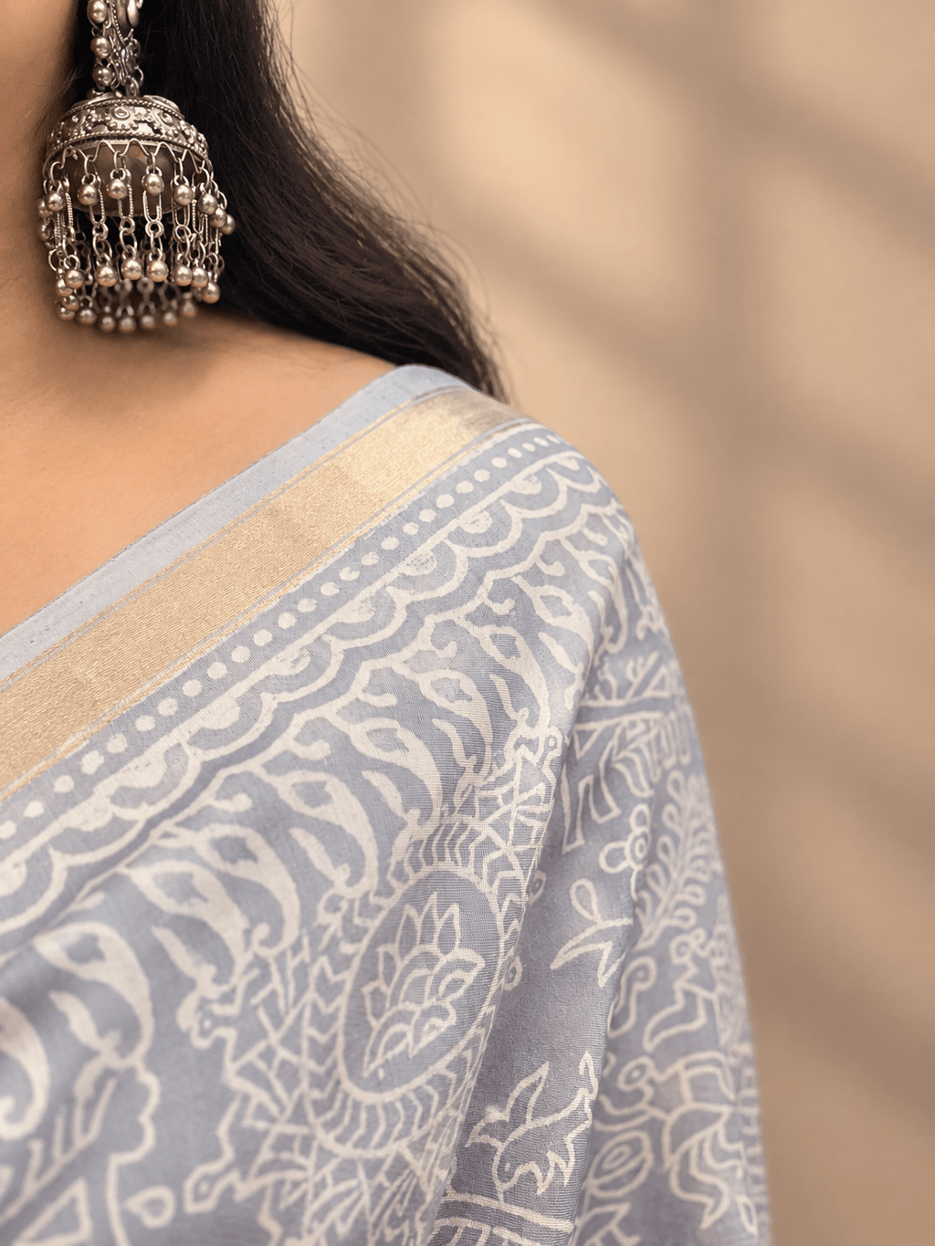 Silver Grey Crepe Silk Saree with Floral & Geometric Motifs and Zari Border