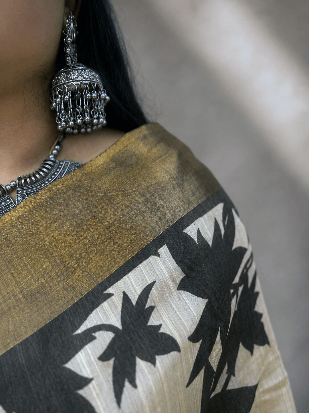 Kasturi Brown Tussar Ghicha Silk Cotton Saree with Brown Floral Motifs & Zari Border