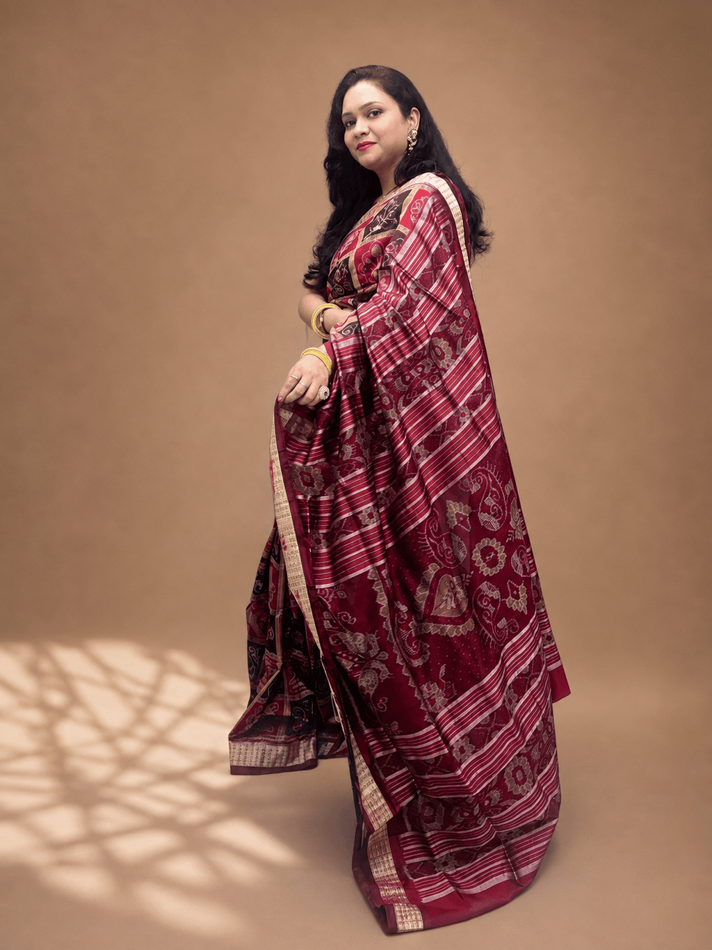 Madhuri Dixit Nabakothi Maroon Red Sambalpuri Patta Silk Saree with Nine Motifs & Ikat Detailing